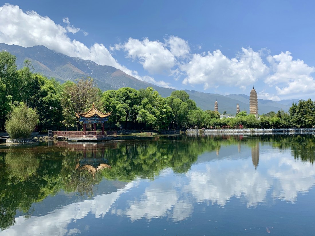 Temple architecture, lake and mountains in Dali