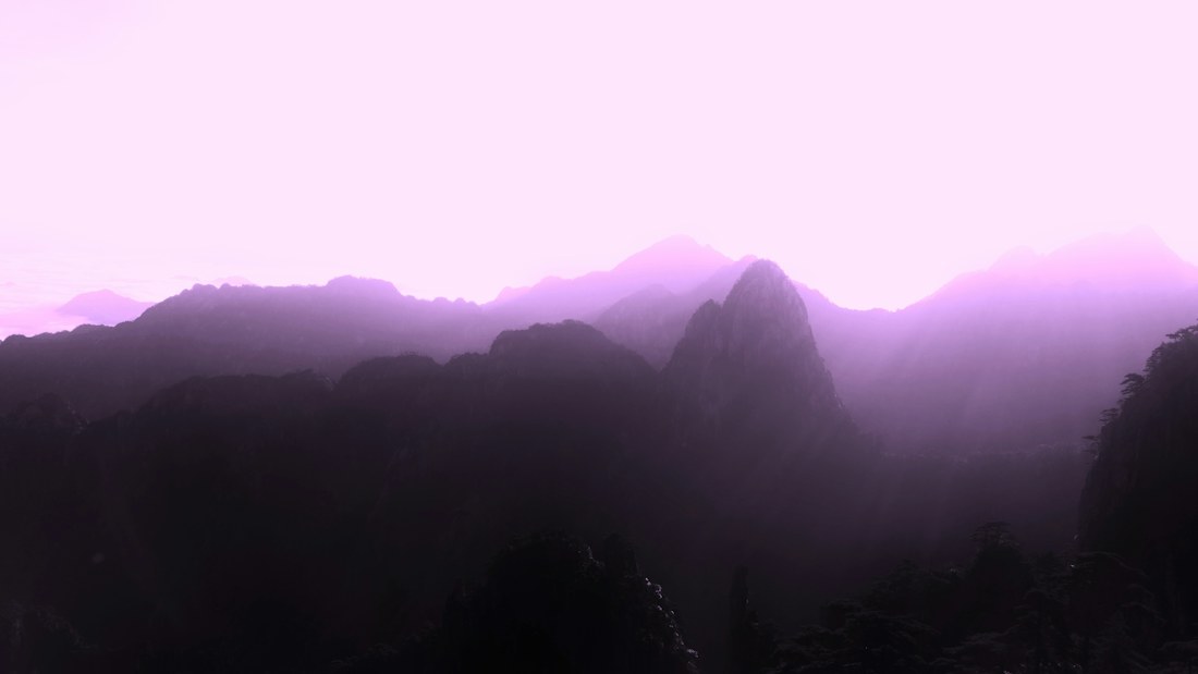 Sunrise over Huangshan mountain peaks