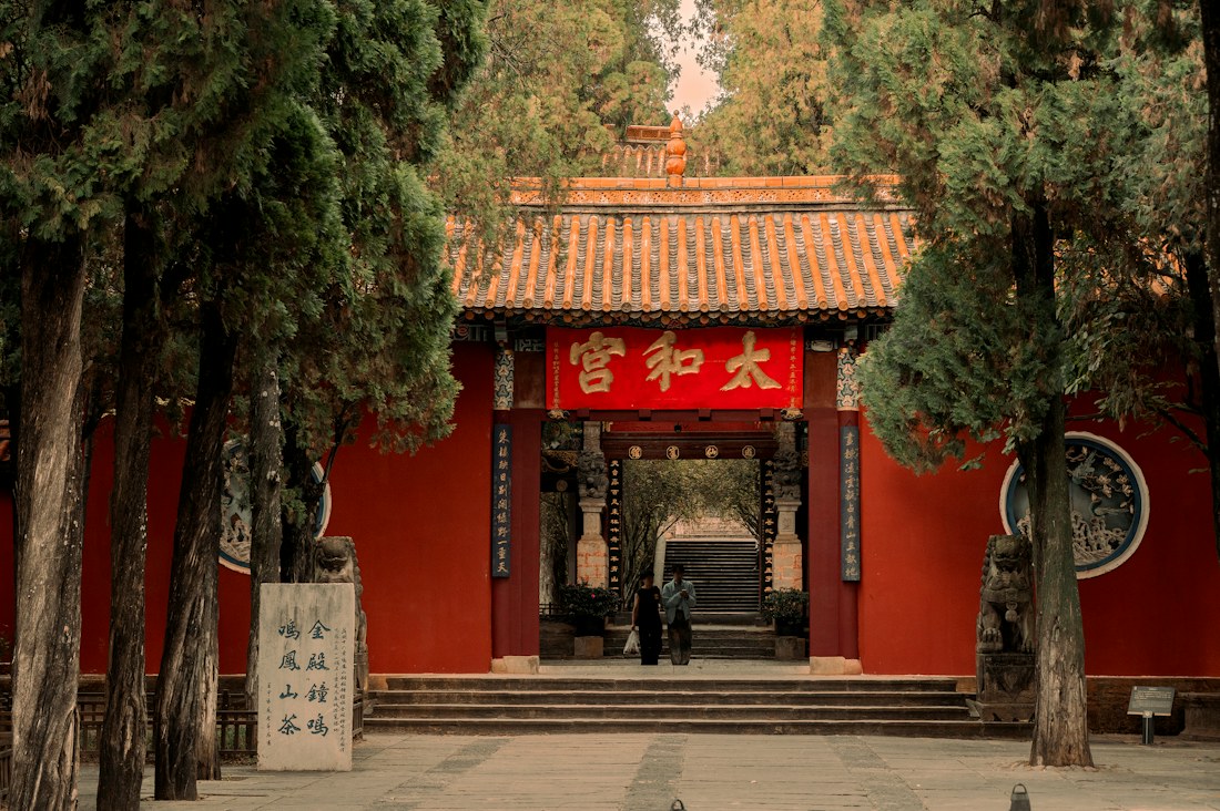 Traditional red building in a Kunming park